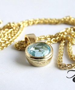 Gouden hanger met topaas en ketting