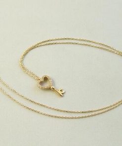 Gouden ketting en zirkonia harten sleutelhanger