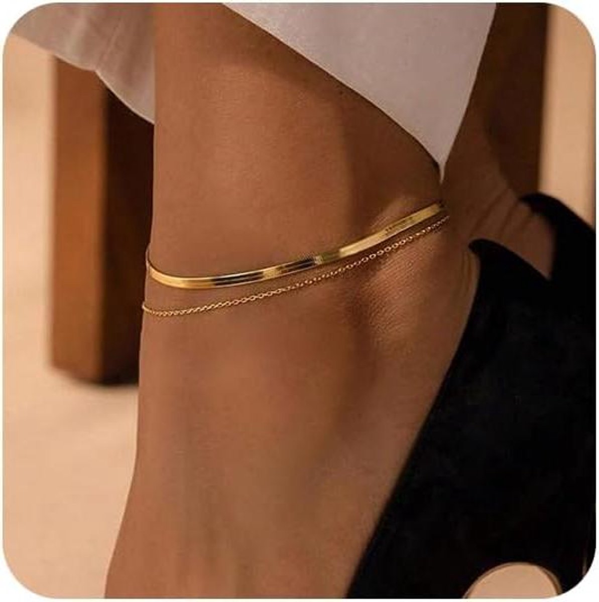 Merkloos / Sans marque | Allecto Plus - Set van 2 gouden enkelbandjes voor dames - Waterdichte goudkleurige enkelband - Enkelkettingen voor vrouwen - Gelaagde enkelband schakels | Koop bij 14Karaats.nl Merkloos / Sans marque | Allecto Plus - Set van 2 gouden enkelbandjes voor dames - Waterdichte goudkleurige enkelband - Enkelkettingen voor vrouwen - Gelaagde enkelband schakels | Nu te koop bij 14Karaats.nl | 10001083-Anklets