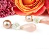Sophie | oorringen in wit goud gezet met roze parel
